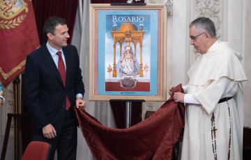 El cartel representa una pintura de Andrés Carrasco de la Virgen bajo su antiguo templete