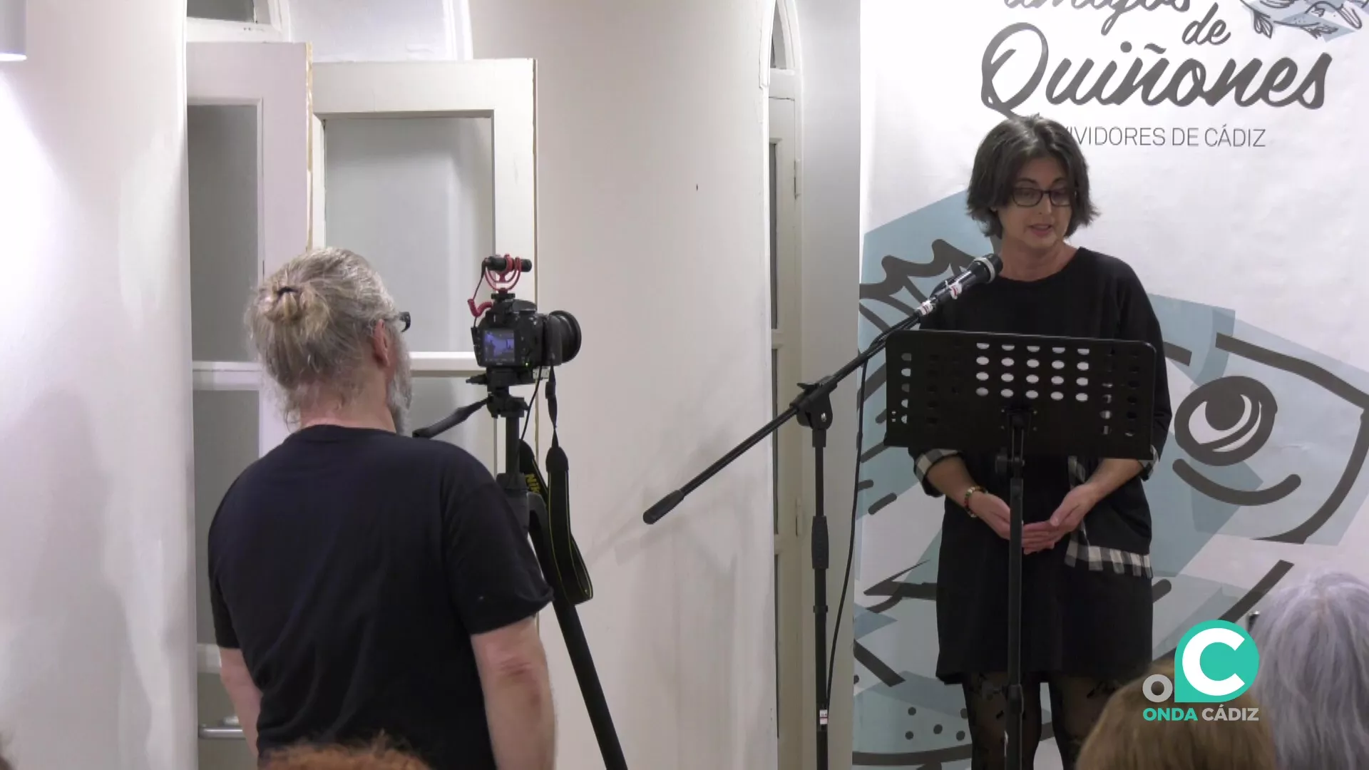 Una de las lectoras interviene en el acto